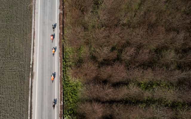 Aerial view of cyclists riding near Liyu Lake in Taiwan