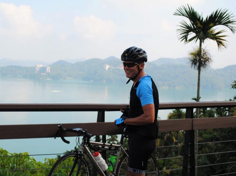 cyclist by sun moon lake